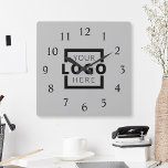 Horloge Carrée Logo de Custom Company<br><div class="desc">Add your custom corporate logo to create a wall clock. Makes a great promotional giveaway or corporate gift for customers,  vendor,  employees or other special people. choose from different clock shapes and sizes. No minimum quantity,  no setup fees.</div>