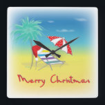 Horloge Carrée Merry Christmas, Santa Hat, Palm Tree, Beach<br><div class="desc">Joyeux Noël avec Santa Hat,  Palm Tree,  Parapluie de plage et chaise Illustration par Inge Lewis. Trouvez d'autres articles correspondants dans le magasin ingeinc.com.</div>