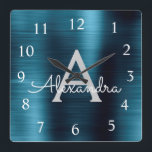 Horloge Carrée Monogramme métallique élégant bleu moderne Nom<br><div class="desc">Monogramme d'huile d'acier inoxydable moderne et élégant Blue Faux Nom et horloge murale personnalisée initiale. L'horloge murale est le cadeau parfait pour quelqu'un qui aime la décoration métallique chic branchée à donner comme cadeau de Noël ou d'anniversaire.</div>