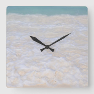 Horloge Carrée Mousse de plage de la mer des Caraïbes ensoleillée