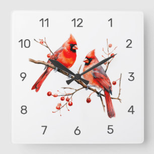 Horloge Carrée Oiseaux cardinaux rouges sur la branche de l'Holly
