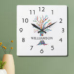 Horloge Carrée Personalized Rainbow Tree Square Wall Clock<br><div class="desc">This colourful Wall Clock is decorated with a mosaic family tree in the colors of the rainbow.
Easily customizable with your name.
Because we create our own artwork you won't find this exact image from other designers.
Original Mosaic © Michele Davies.</div>