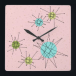 Horloge Carrée Pink Iconic Atomic Starburst Wall Clock<br><div class="desc">This Pink Iconic Atomic Starburst Square Acrylic Wall Clock pattern feels iconic atomic starbursts. That's right ! La vieille école, la première dame rose colorée, with gold speckles is the perfect backdrop for the vibrant turquoise, soothing celery, and kitschy pear green colored circles. Les spots of color are sporadically placed...</div>