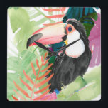 Horloge Carrée Portrait toucan avec Feuilles tropicaux<br><div class="desc">Toucan Palms I par Jennifer Paxton Parker. Un petit toucan se dresse au milieu d'une végétation tropicale aux couleurs vives,  dans un style aquarelle. | 133068GG</div>