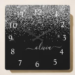 Horloge Carrée Script Monogram Girly Name<br><div class="desc">Parties scintillant Argent et Noir Étincelle Script Monogramme Nom Horloge. Cela rend le cadeau parfait pour 16 ans,  mariage,  douche nuptiale,  anniversaire,  baby shower ou bachelorette pour quelqu'un qui aime le luxe glam et les styles chic.</div>