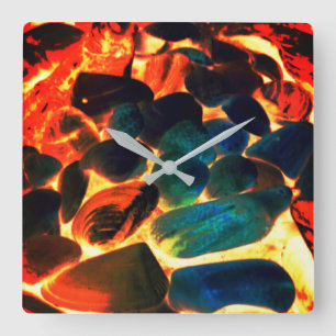 Horloge Carrée Sea oyster shell on red-hot volcanic lava or ember