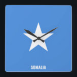 Horloge Carrée Somalia Flag Dazzling Patriotic<br><div class="desc">Somalia Flag Dazzling Patriotic Square Wall Clock in the colors and the element of the Somalia national flag covering the front of the clock. National flag colors are complemented with the text "Somalia" on the bottom. Texte is fully customizable using "Customize it!" feature. Feel free to change it, remove it...</div>