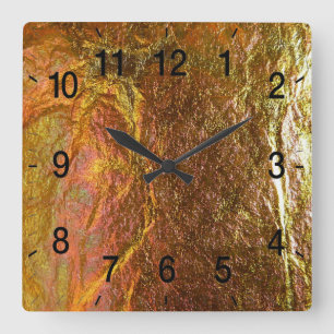 Horloge Carrée Texture plaquée or et laiton avec une patte de cri