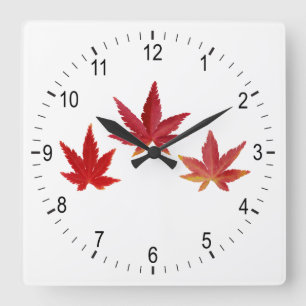 Horloge Carrée Trois feuilles rouges en chute