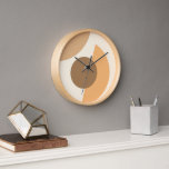 Horloge Cercles géométriques Abstraits chic Motif d'art mo<br><div class="desc">Beau café contemporain beige, caramel brun brun, apricot clair orange et ivoire cercles ronds motif sur un arrière - plan blanc cassé ivoire. Design orné, élégant, élégant et éclectique pour la fashionista artistique de fantaisie, la diva de mode artistique, populaire branché, style d'art rétro vintage et abstrait amoureux de motifs...</div>