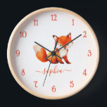 Horloge Couleur d'eau Fox mignonne rouge Script Nom de la<br><div class="desc">Pour la chambre d'un enfant. Au centre, il y a un mignon renard rouge. Sous l'illustration, le nom de l'enfant est écrit dans un script rouge. L'animal est généré avec DALL-E 2 de OpenAI. J'ai le droit d'utiliser mes générations pour n'importe quel usage légal, y compris à des fins commerciales,...</div>