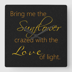 Horloge de citation de tournesol noir