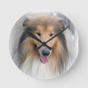 Horloge de la lassie de chien de chiot