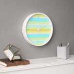 Horloge Eté Soleil Jaune Aqua Bleu Aquarelle Rayures<br><div class="desc">Belle aqua contemporaine bleu turquoise, orange jaune et blanc rayé motif. Un design géométrique moderne et élégant pour les amateurs de couleurs estivales. Disponible sur une variété de mignonette, tendance et élégante décoration de maison accents et accessoires pour ceux qui aiment égayer leur maître ou chambre d'enfants, pépinière, salon ou...</div>