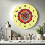 Horloge kaléidoscope colorée en rouge sur jaune<br><div class="desc">Ajoutez un éclat de couleur et de flair artistique à votre espace avec cette horloge murale kaléidoscope vibrante! Le design central fascinant est composé de rouge gras, de bleu et de motifs complexes, placés sur un fond jaune doux pour une pop de fantaisie. Parfait pour égayer n'importe quelle pièce, ce...</div>