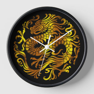 Horloge Le feu d'or : l'engraving d'un dragon