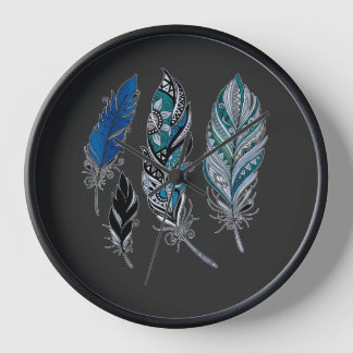 Horloge Les plumes et les couleurs dansent