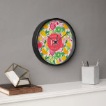 Horloge Motif d'été pour le Monogramme de fruits tropicaux<br><div class="desc">L'horloge Motif d'été Tropical Fruit Monogram apporte une touche vibrante et personnalisée à votre espace. Doté d'une aquarelle colorée de fruits tropicaux, cette horloge allie style et fonctionnalité. Le monogramme ajoute un élément unique et personnalisé, ce qui en fait un complément parfait à votre cuisine, salon ou bureau. Avec sa...</div>