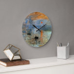 Horloge murale avec impression Claude Monet, lever<br><div class="desc">Voici notre nouvelle horloge murale avec l'impression révolutionnaire de Claude Monet "Impression, Sunrise" peinture. Cette horloge est disponible en forme de rond et de carré, ce qui vous donne la souplesse de choisir celle qui correspond le mieux à votre décor. L'horloge est également fournie avec l'option d'une garniture en bois,...</div>