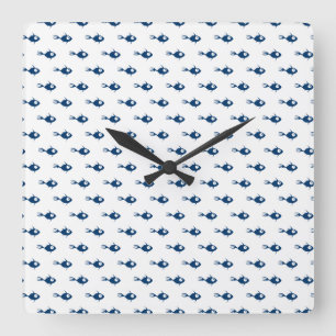 Horloge murale bleue de motif de poissons