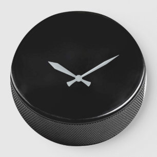 Horloge murale de galet d'hockey