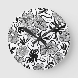 Horloge murale de patchs de fleurs noires