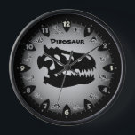 Horloge murale du dinosaure gris Bedrock<br><div class="desc">Racontez l'heure dans le style préhistorique avec cette horloge à thème Dino gris cool. Méfiez-vous des dinosaures prêts à s'embusquer de leur cachette entre les dents de l'heure. Le texte personnalisable fait de cette pièce de temps Triassic une excellente idée cadeau personnalisée pour les passionnés de Dino.</div>
