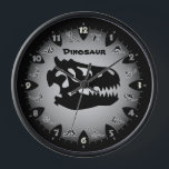 Horloge murale du dinosaure gris Bedrock<br><div class="desc">Racontez l'heure dans le style préhistorique avec cette horloge à thème Dino gris cool. Méfiez-vous des dinosaures prêts à s'embusquer de leur cachette entre les dents de l'heure. Le texte personnalisable fait de cette pièce de temps Triassic une excellente idée cadeau personnalisée pour les passionnés de Dino.</div>