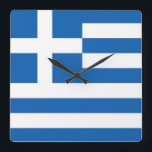 Horloge murale du drapeau grec<br><div class="desc">Le drapeau de la Grèce (communément appelé "bleu-blanc ciel" ou "bleu-blanc" et en grec : "Γ α ν λ λ " ou " "), officiellement reconnu par la Grèce comme l'un de ses symboles nationaux, est basé sur neuf bandes horizontales égales de bleu alternant avec blanc. Il y a un...</div>