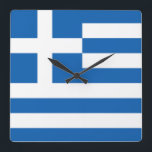 Horloge murale du drapeau grec<br><div class="desc">Le drapeau de la Grèce (communément appelé "bleu-blanc ciel" ou "bleu-blanc" et en grec : "Γ α ν λ λ " ou " "), officiellement reconnu par la Grèce comme l'un de ses symboles nationaux, est basé sur neuf bandes horizontales égales de bleu alternant avec blanc. Il y a un...</div>