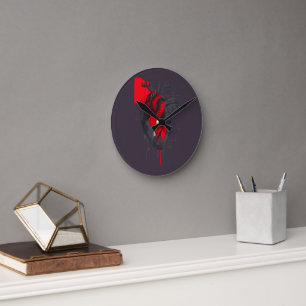 Horloge murale en forme de cœur humain avec taches