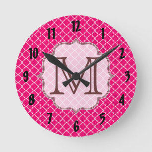 Horloge murale en latte rose chaud