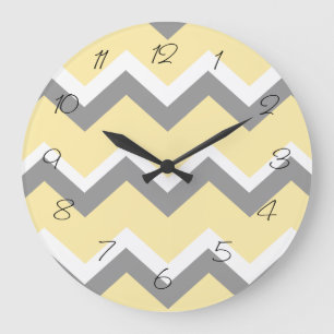 Horloge murale grise et jaune de Chevron
