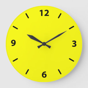 Horloge murale jaune avec chiffres noirs