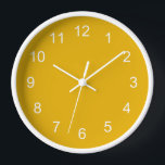 Horloge murale jaune moutarde<br><div class="desc">Horloge murale jaune moutarde. Design simple et élégant de couleur moutarde simple,  avec des heures blanches.</div>