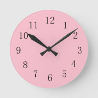 Horloge murale rose pâle