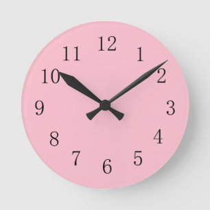 Horloge murale rose pâle