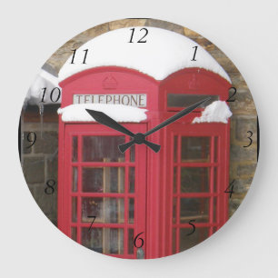 Horloge murale rouge de boîte de téléphone avec