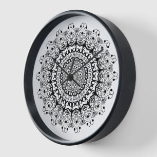 Horloge Noir sur blanc orné motif