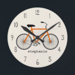 Horloge orange de bicyclette<br><div class="desc">Une horloge comportant comportant une illustration d'une bicyclette orange. Personnalisez avec votre nom.</div>