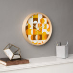 Horloge Orange Summer Jaune foncé Brown Retro Art Motif<br><div class="desc">Beau blanc contemporain, jaune ensoleillé, orange, marron foncé cercles géométriques et demi-cercles motif. Elégant, élégant et éclectique design minimaliste pour le décorateur artistique, le décorateur artistique, le populaire branché, le style rétro vintage ou l'abstrait amateur de motifs géométriques numériques. Associez ce design à vos couleurs de décoration intérieure et décorez...</div>