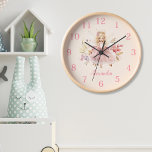 Horloge Pixie de jardin floral fée magique personnalisée<br><div class="desc">Ajoutez une touche d'enchantement à votre petite chambre avec notre horloge Pixie Jardin Floral Fée Personnalisée ! Cette horloge exquise est la façon parfaite d'ajouter du fantaisie et du charme à leur espace tout en les aidant à apprendre à dire l'heure. Conçu avec soin et attention aux détails, notre horloge...</div>