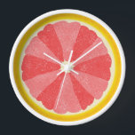 Horloge Pop en tranches de pamplemousse Art minimaliste cu<br><div class="desc">Cette horloge aux pamplemousses colorées est parfaite pour votre cuisine ou décor de coin petit-déjeuner. Il montre une image découpée ouverte d'un agrumes de pamplemousse moitié avec 12 tranches en alternance dans les tons roses, pour vous permettre de dire l'heure sans chiffres. Ce design insolite a un look texturé -...</div>