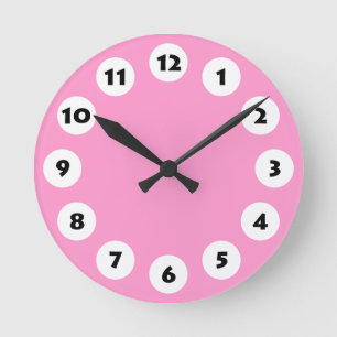 Horloge Ronde 12 taches - noir avec le blanc sur le rose