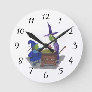 Horloge Ronde 2 sorcières brassant dans l'Halloween de Cauldron