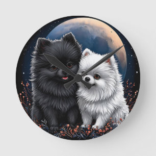 Horloge Ronde Adorables chiots Pomeranian noir et blanc