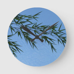 Horloge Ronde bambou sur ciel de nuages