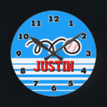 Horloge Ronde Baseball wall clock with name for sporty boys<br><div class="desc">Baseball wall clock with name for sporty boys. Cute design for little ball players or nursery room. Personalize with name of child. Custom background color ie blue or pink for girl. Décor de la crème du Guide.</div>