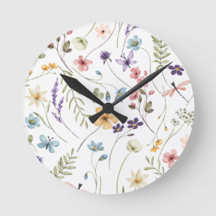 Horloge Ronde Bébé dans le jardin de fleurs sauvages Baby in Blo