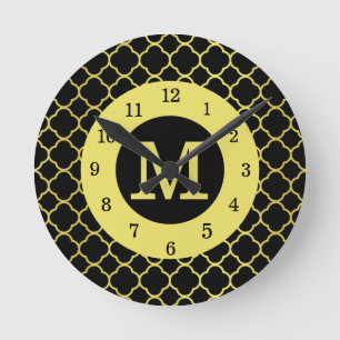 Horloge Ronde Cadran rond monogrammé en quatrefeuilles noir doré